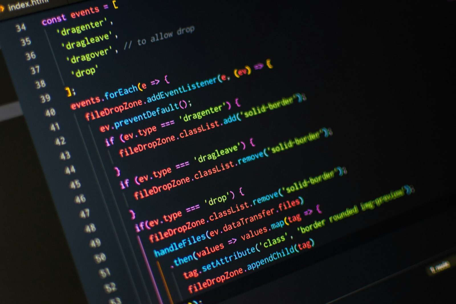 JavaScript code in an editor, handling files dropped onto a web page