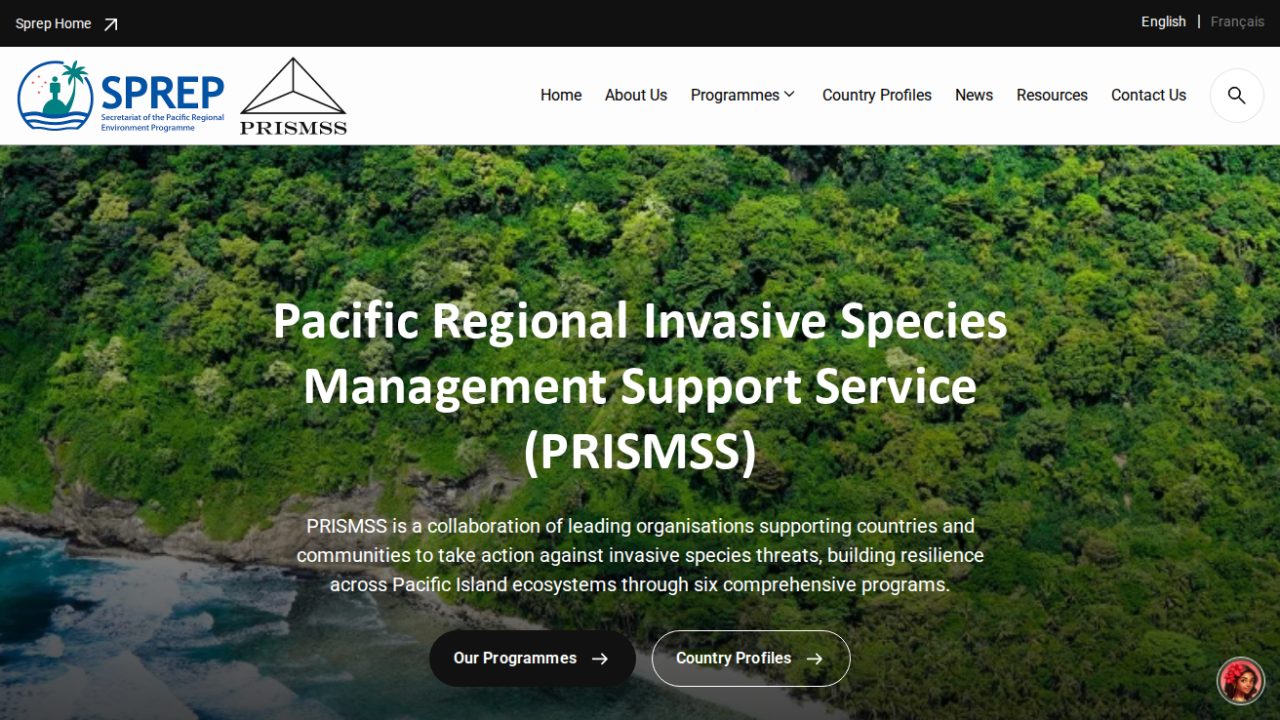 PRISMSS homepage in English with a French language switch, over an aerial photo of Pacific forest