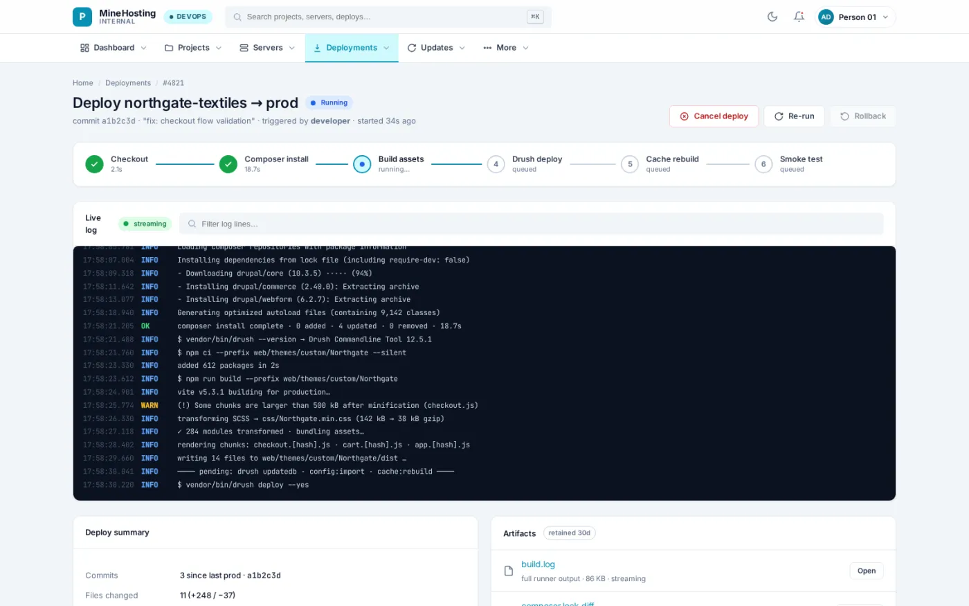 A running deploy streams its log line by line through checkout, dependency install, asset build and database update, with cancel and rollback to hand.